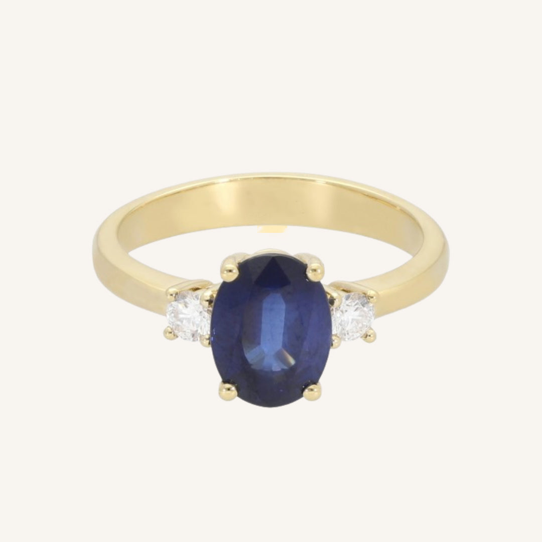 ANILLO ZAFIRO OVALADO Y ORO